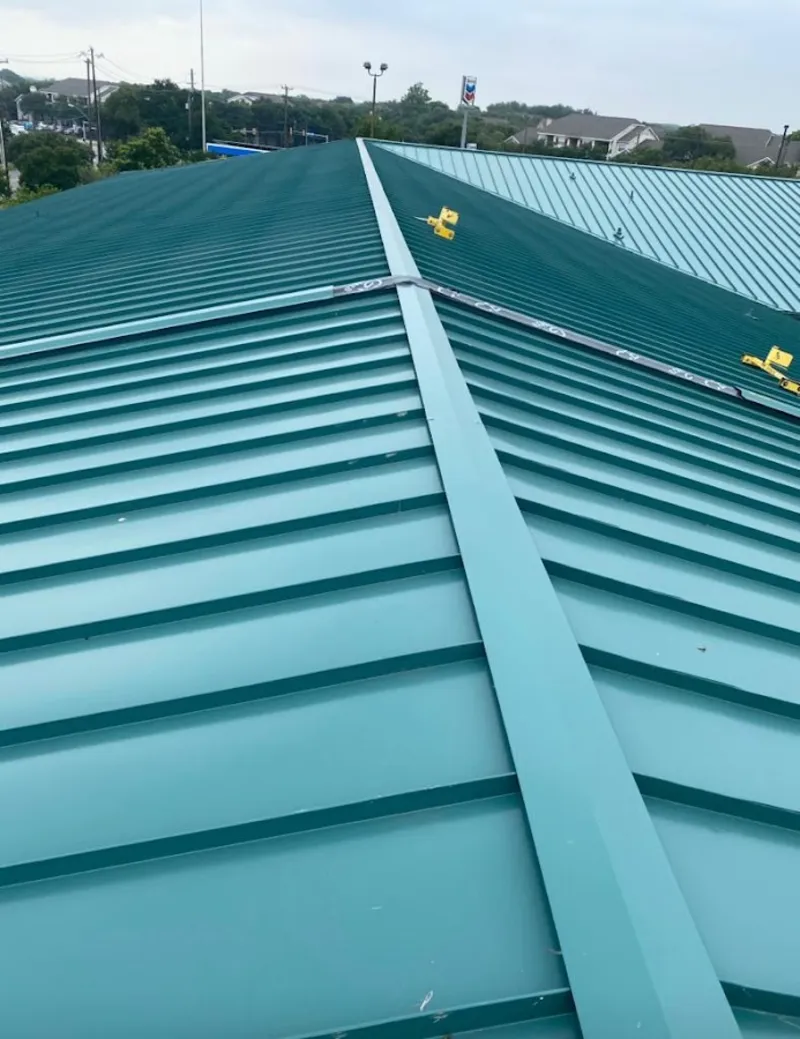 Green commercial metal roof ridge and valley for Metal Roof Repair in Garnet
